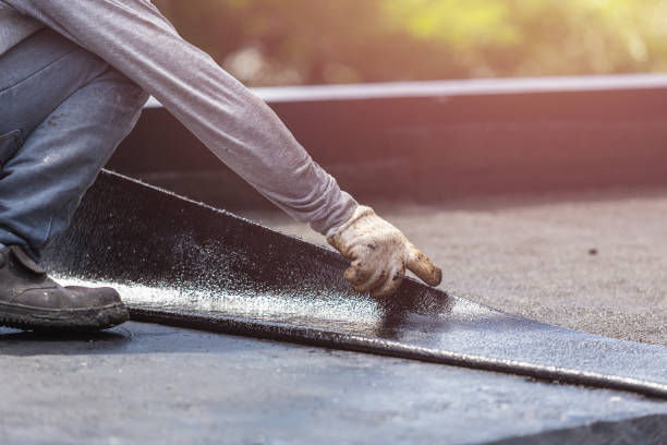 Professional Basement Waterproofing technician working in Columbia, KY